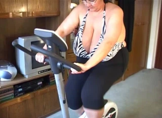 BigSandra Sandra on the exercise bike