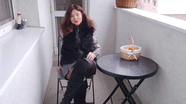 Jet fountain of squirt on an open balcony